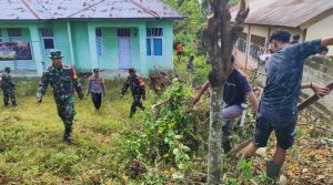 Jelang HUT TNI, Koramil 1316/02 Paguyaman Gelar Karya Bakti