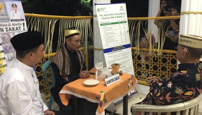 Bupati Ismet Mile Tunaikan  Zakat Fitrah Lewat Baznas Bone Bolango, Harap Jadi Instrumen Kesejahteraan Umat